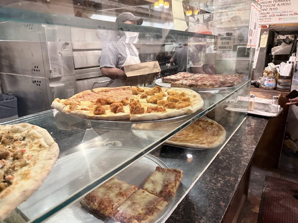 Assorted Pizza Slices and Pies